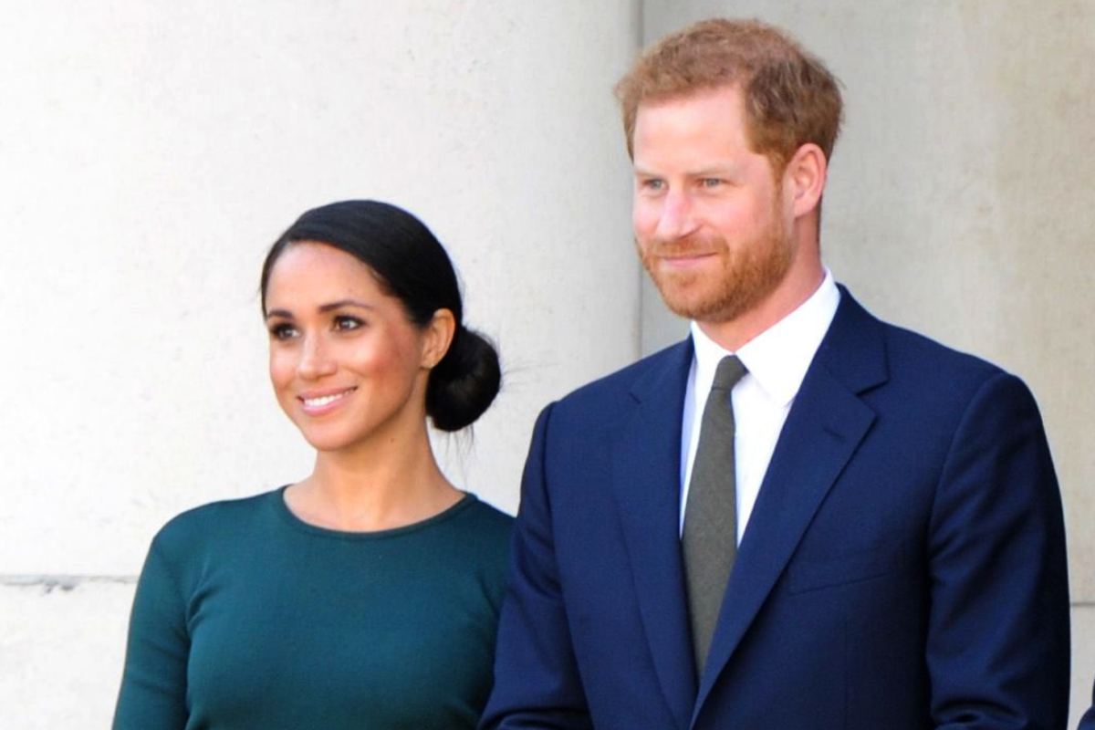 Harry e Meghan durante un evento pubblico per la Royal Family